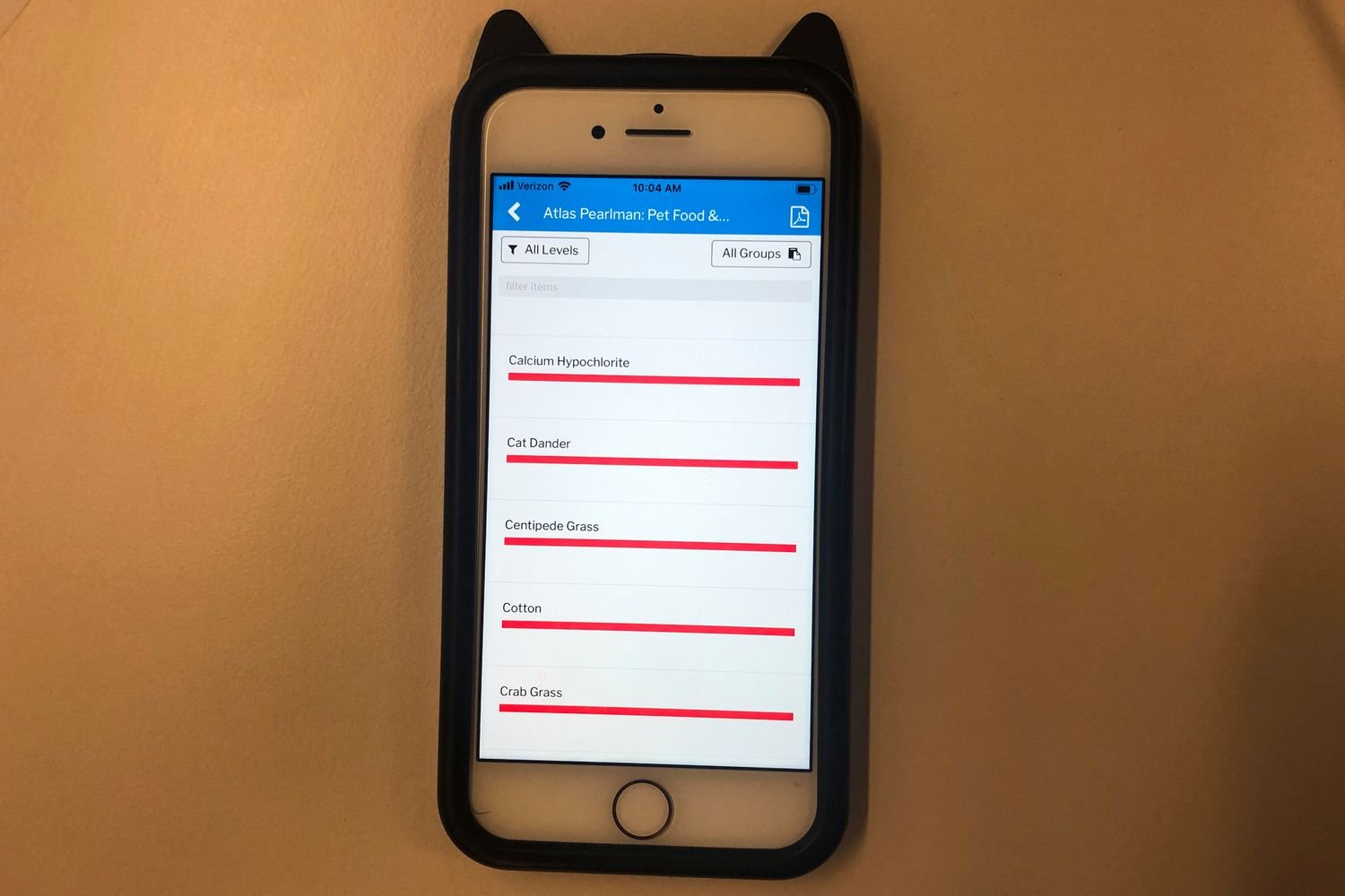 A phone showing results from the 5Strands Pet Food & Environmental Intolerance Testing Kit